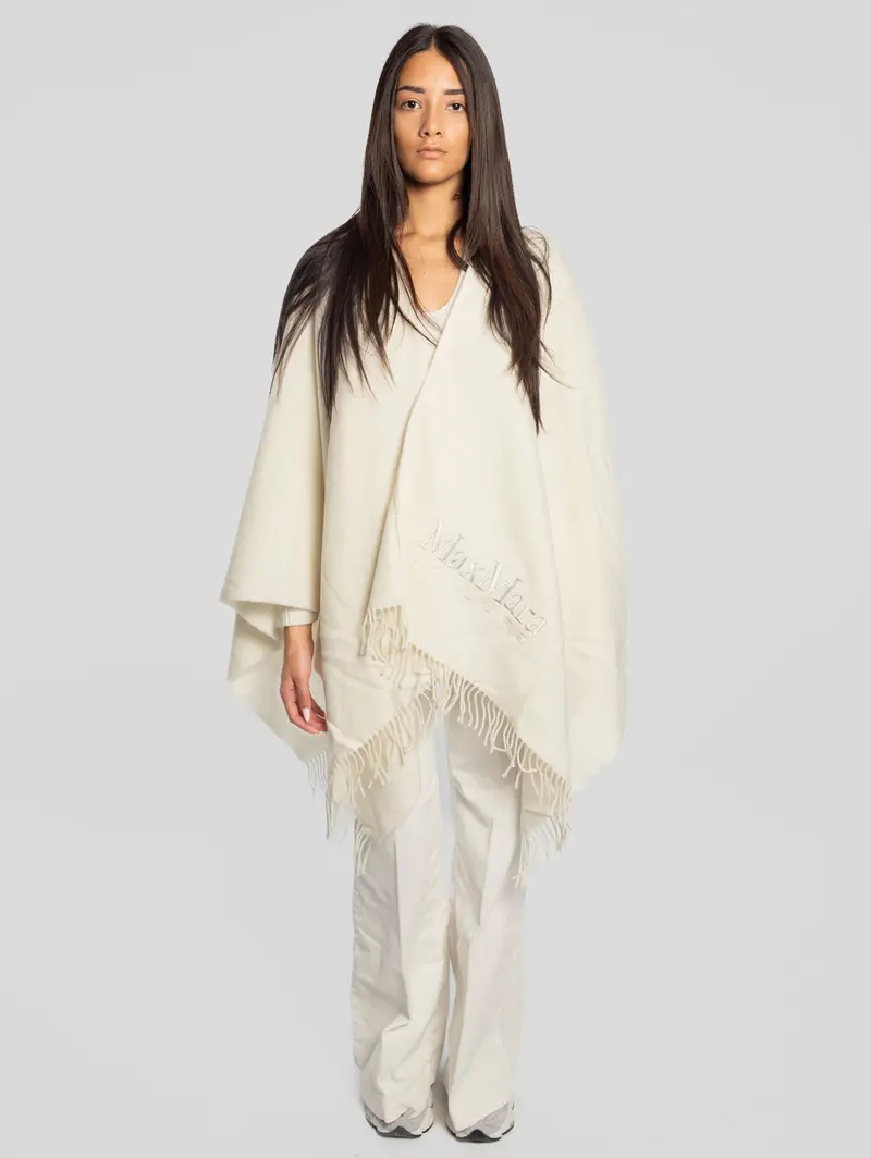 Fringed Wool Poncho In Cream 1